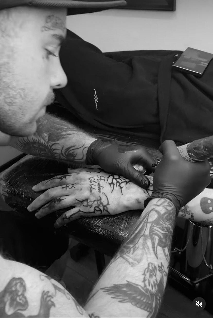 Alex St George - work Alex St George doing tattoo work